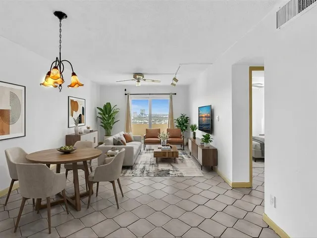 a view of a dining room and livingroom