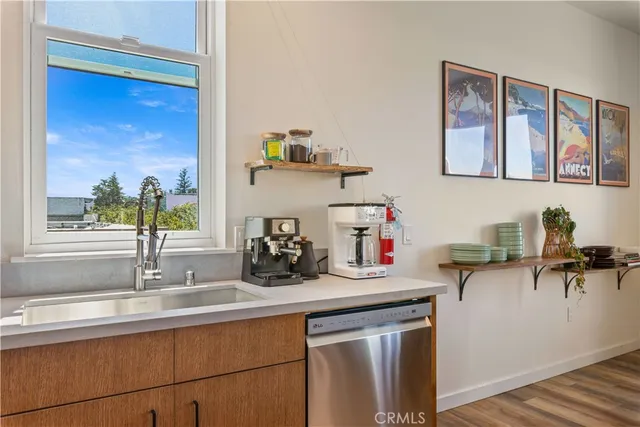 an aerial view of residential houses and outdoor space