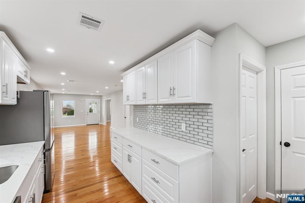 271 North Avenue Wood-Ridge, NJ 07075 - Photo 5 of 18 a view of kitchen with wooden floor