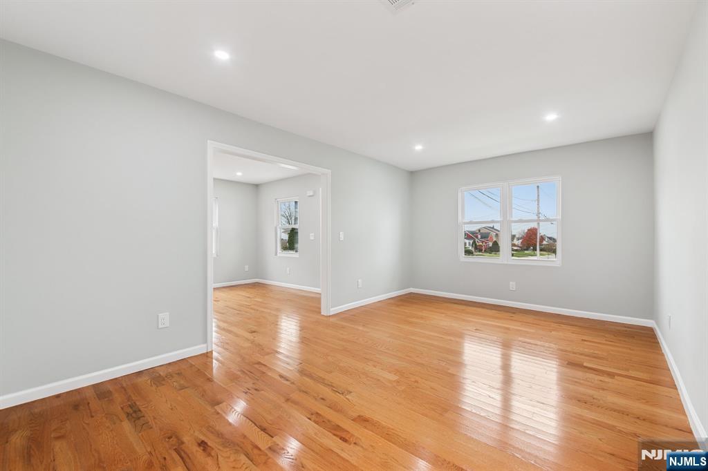 271 North Avenue Wood-Ridge, NJ 07075 - Photo 7 of 18 a view of empty room with wooden floor