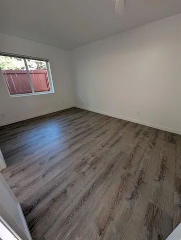 a view of an empty room and window