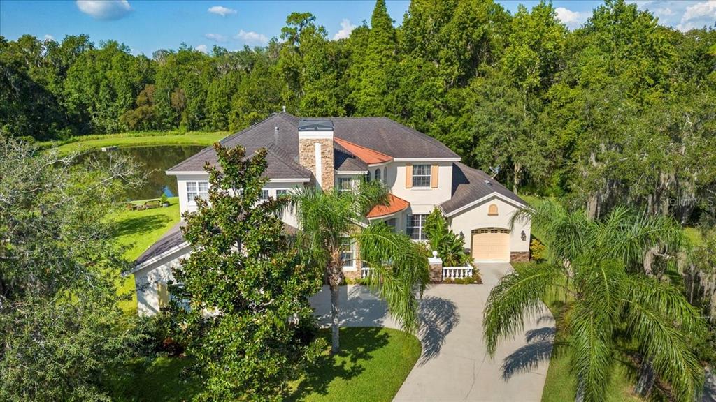 5120 Tari Stream Way Brandon, FL 33511 - Photo 34 of 35 an aerial view of a house with a yard