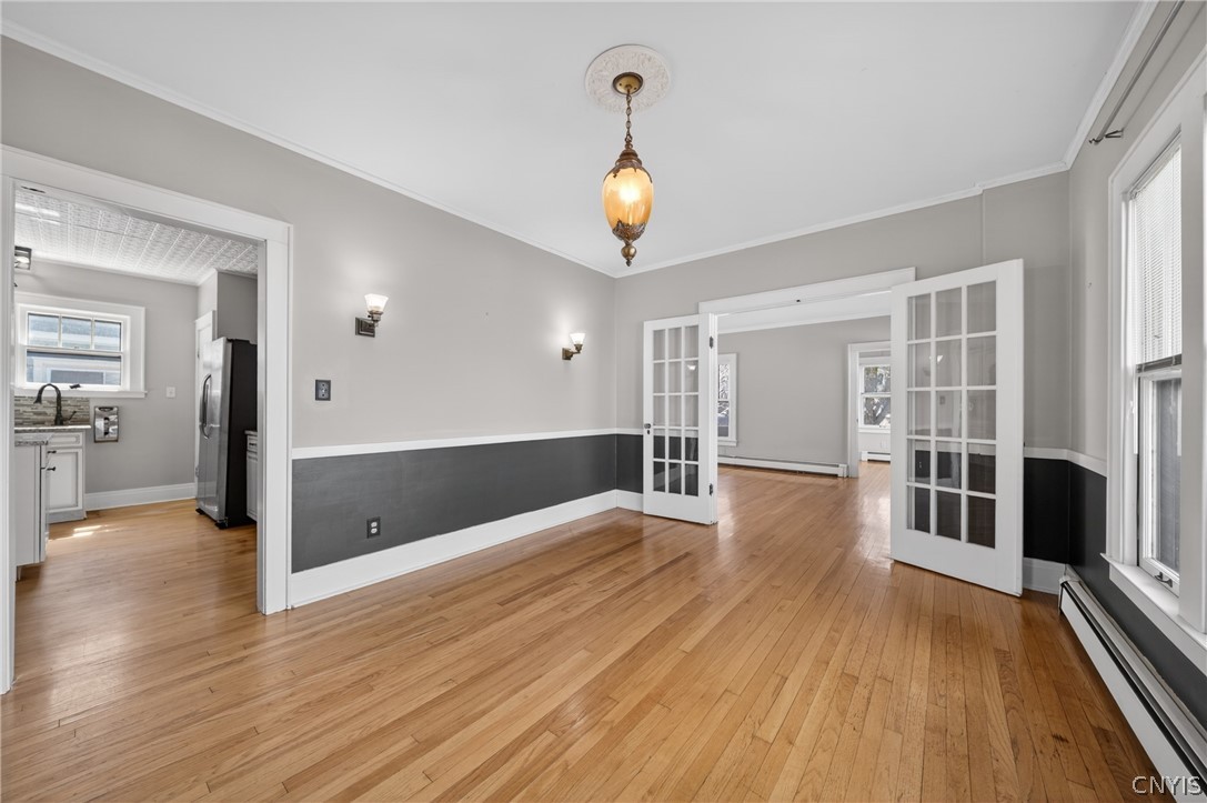 411 Robineau Road Syracuse, NY 13207 - Photo 13 of 50 French doors separate living room from formal dini