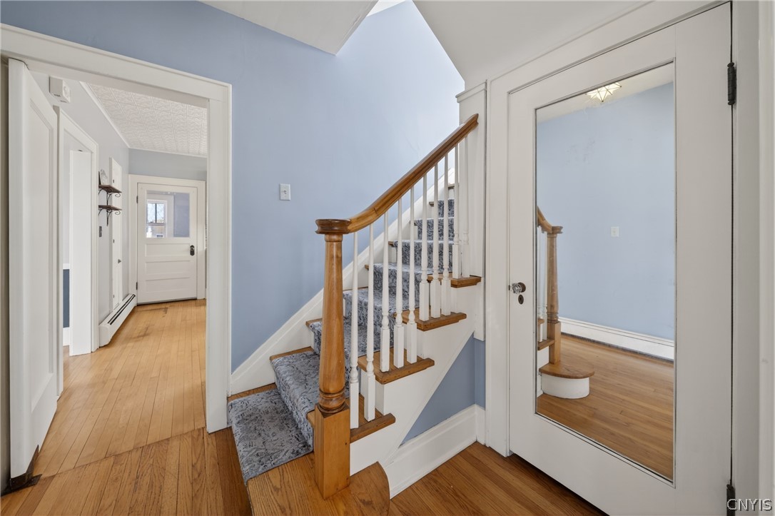 411 Robineau Road Syracuse, NY 13207 - Photo 27 of 50 Hallway from living room to kitchen