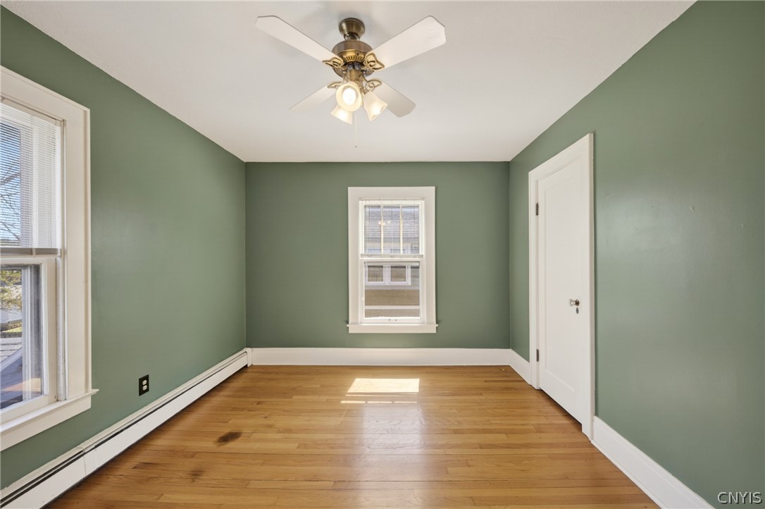 411 Robineau Road Syracuse, NY 13207 - Photo 29 of 50 Bedroom 1 with overhead ceiling fan + light