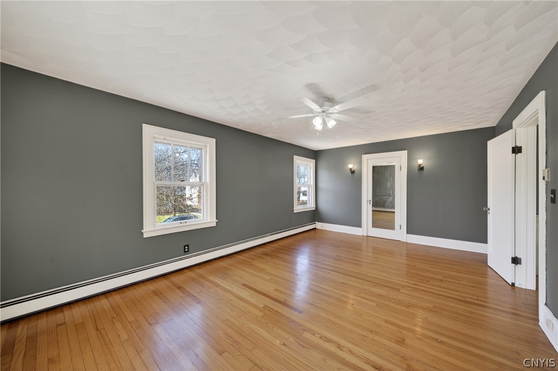 411 Robineau Road Syracuse, NY 13207 - Photo 35 of 50 Main largest bedroom (full length of front of hous