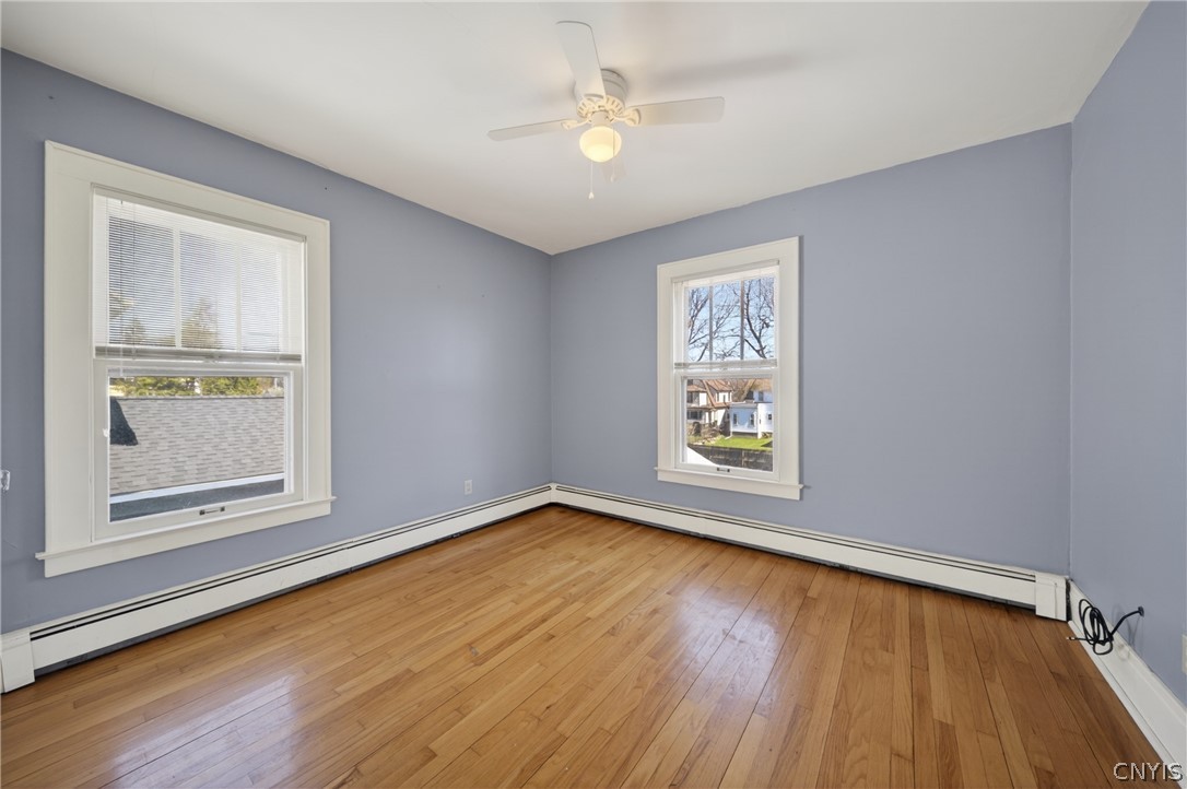 411 Robineau Road Syracuse, NY 13207 - Photo 36 of 50 Bedroom 2 with overhead ceiling fan + light