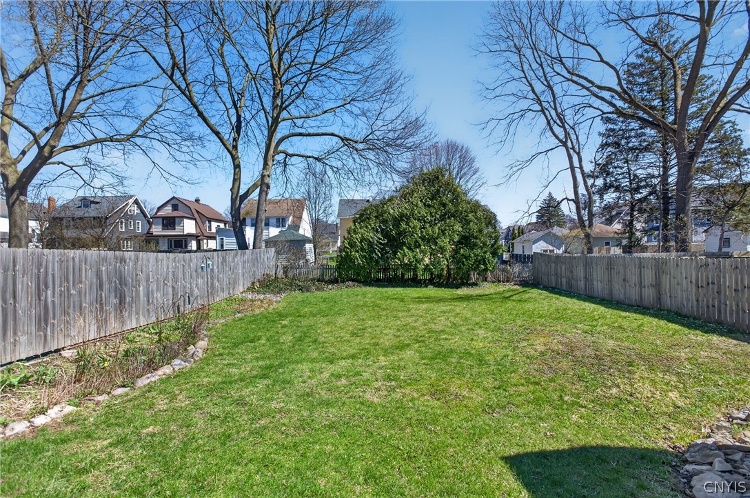 411 Robineau Road Syracuse, NY 13207 - Photo 44 of 50 Generous flat backyard for many activities or gard