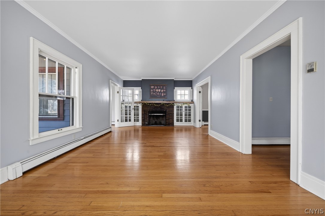 411 Robineau Road Syracuse, NY 13207 - Photo 5 of 50 hardwood floors, wood burning fireplace with built