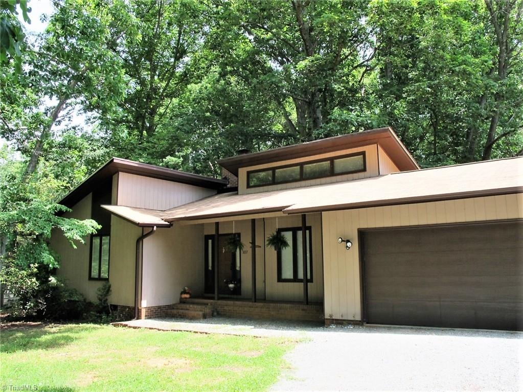 1877 Andrews Farm Road Whitsett, NC 27377 - Photo 1 of 23 Gallery Image 1