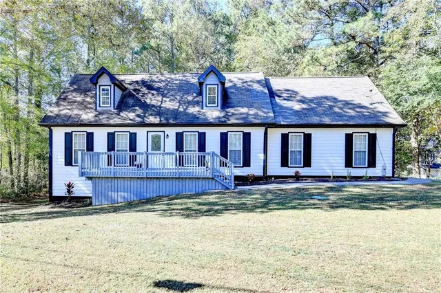 front view of a house with a big yard