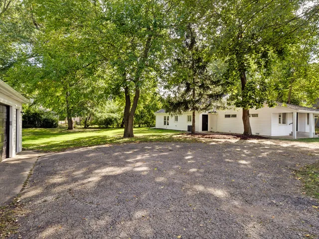 a house with huge green field