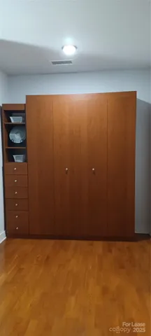 a kitchen with stainless steel appliances granite countertop a stove and a microwave