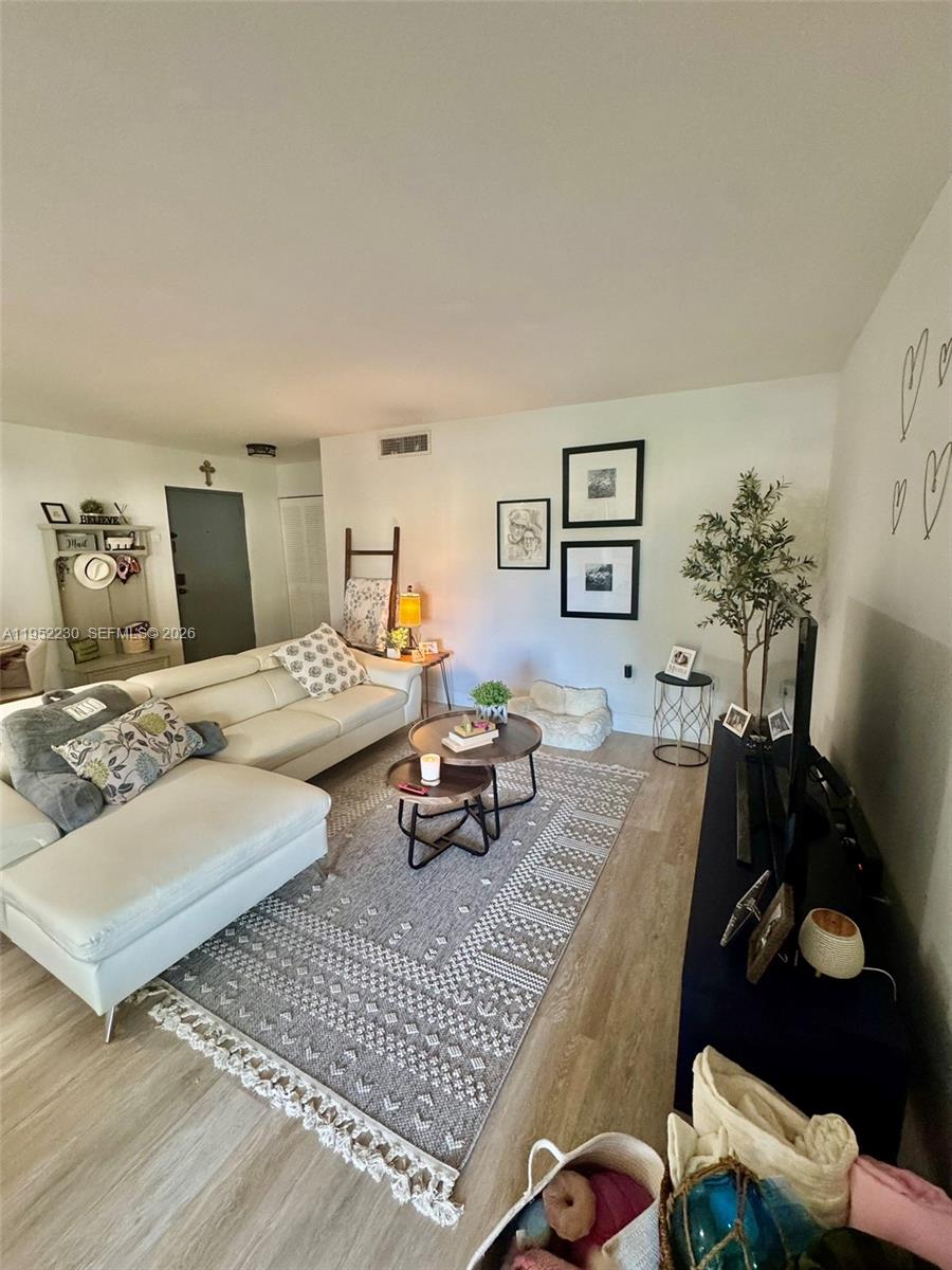 8810 Southwest 123rd Court, Unit M202 Miami, FL 33186 - Photo 5 of 34 a living room with furniture and a couch