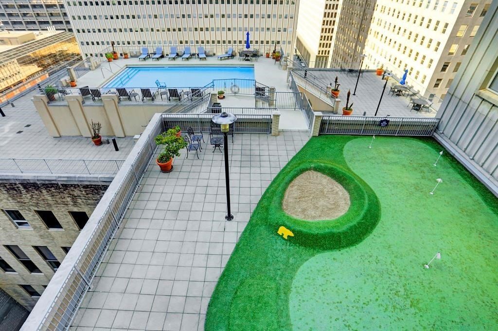 914 Main Street, Unit 704 Houston, TX 77002 - Photo 17 of 22 an aerial view of a house with a swimming pool