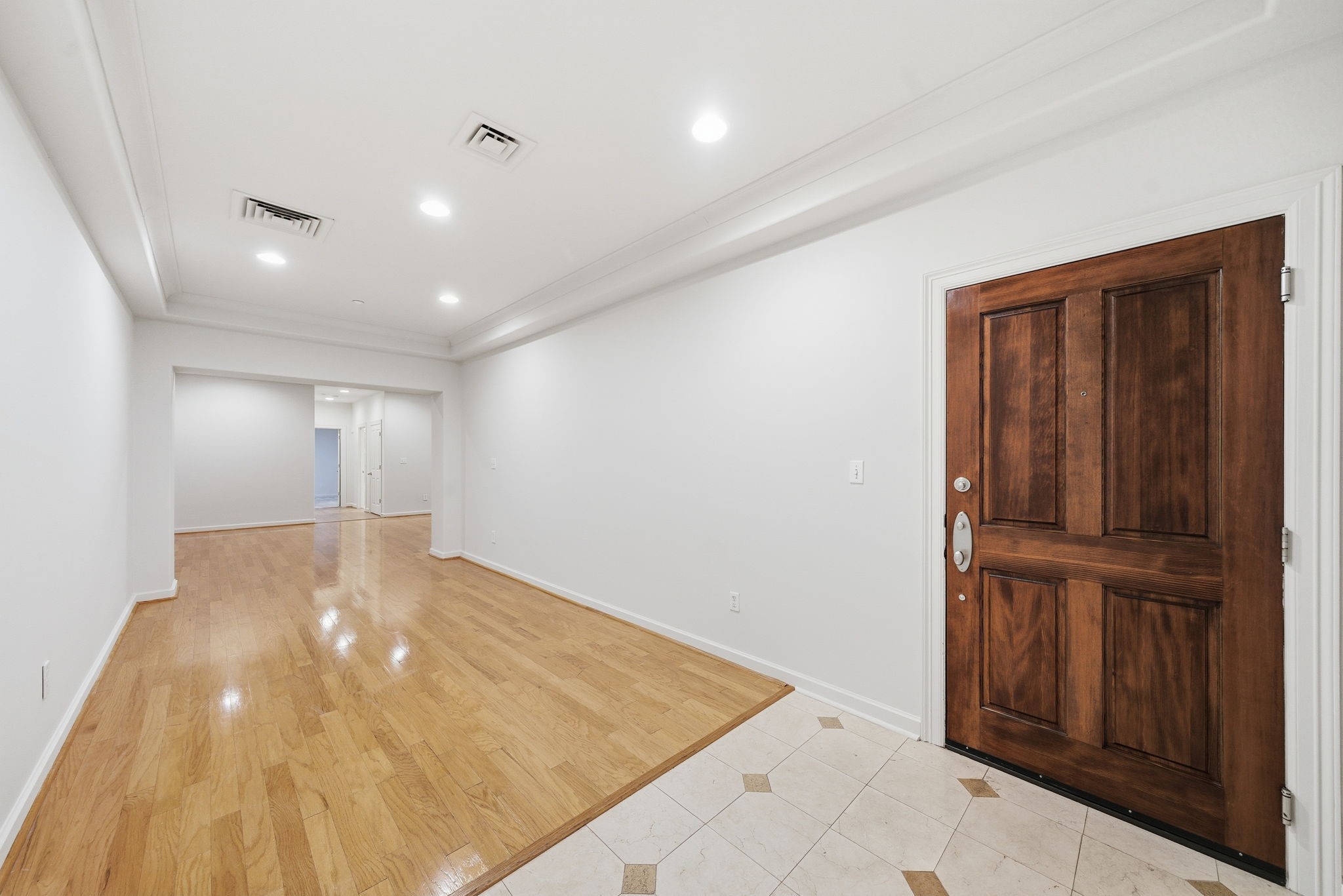 914 Main Street, Unit 704 Houston, TX 77002 - Photo 2 of 22 wooden floor in an empty room