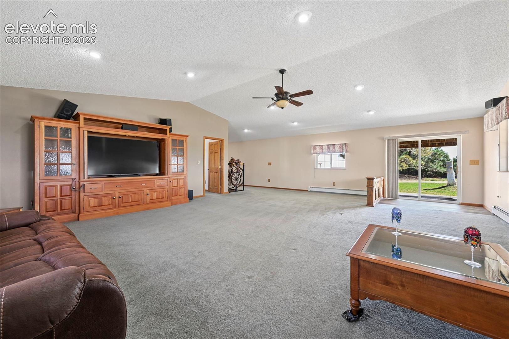35035 Shear Road Yoder, CO 80864 - Photo 5 of 50 Grand Room with recessed lighting and Sliding Door to covered concrete porch