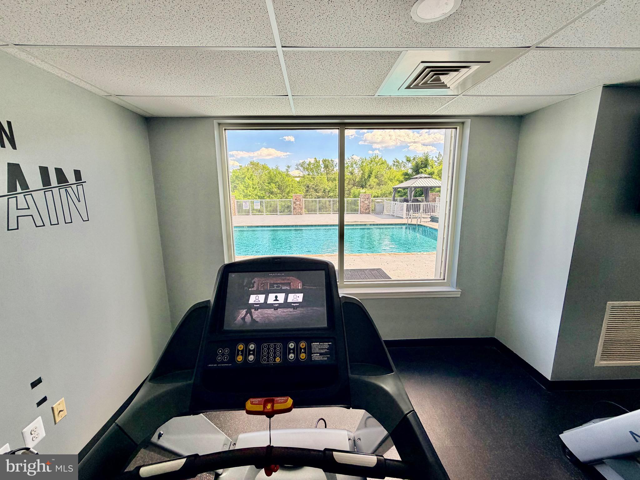 6301 Edsall Road, Unit 418 Alexandria, VA 22312 - Photo 19 of 22 Gym with the view of the pool