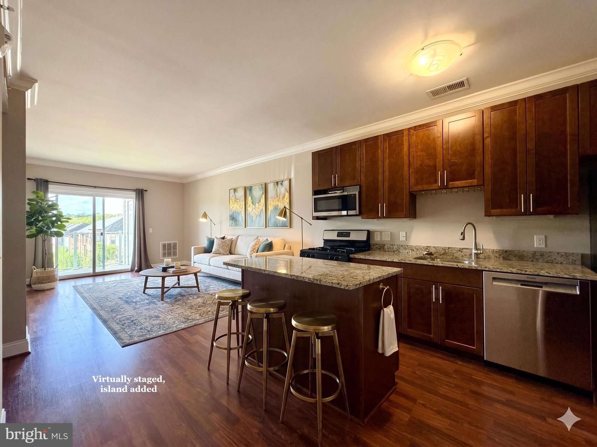 6301 Edsall Road, Unit 418 Alexandria, VA 22312 - Photo 2 of 22 Virtually staged kitchen and living room
