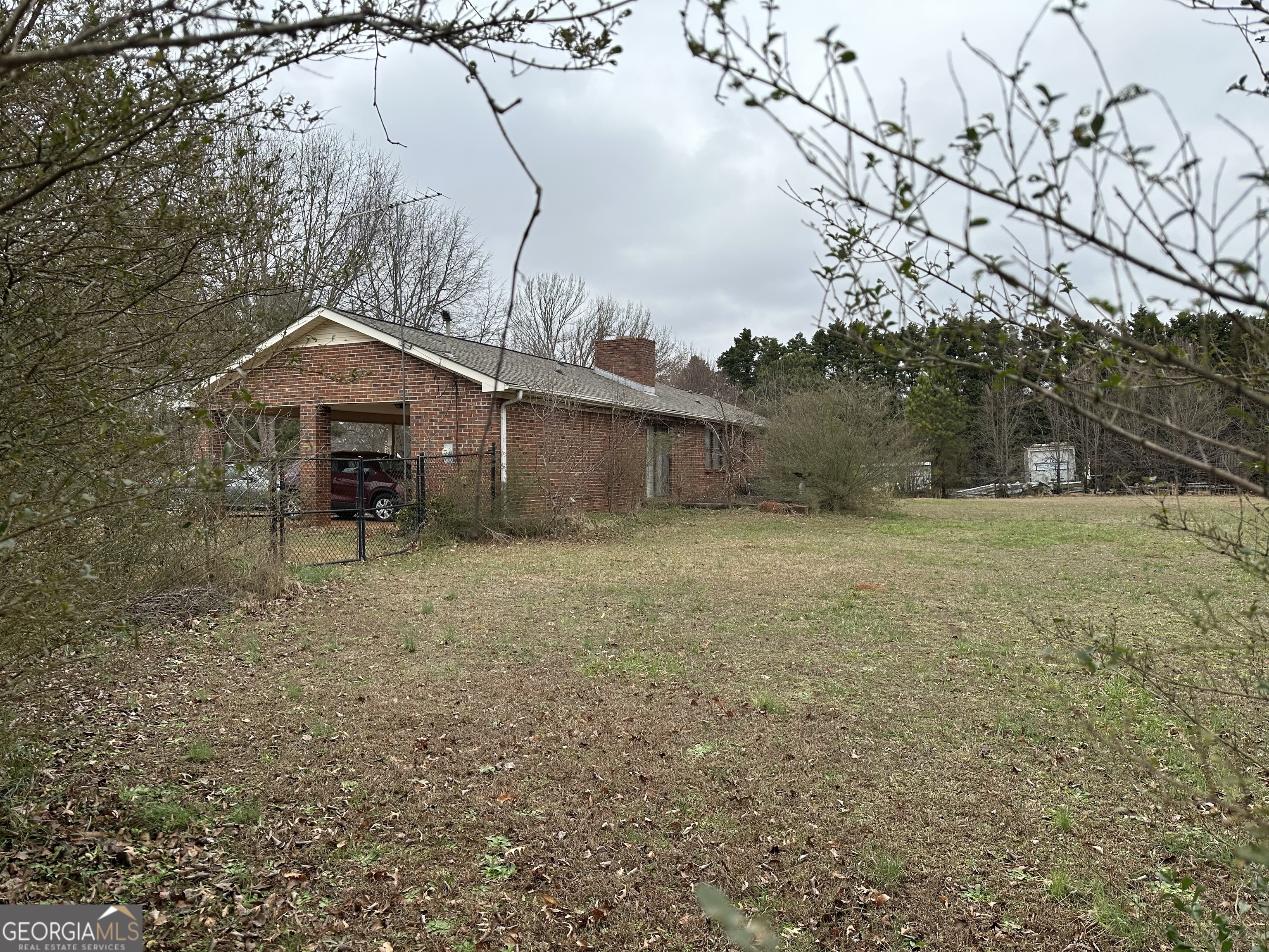 11306 Panhandle Road Hampton, GA 30228 - Photo 3 of 20 a view of a house with a yard