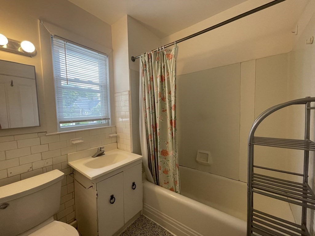 36-2 Lowell Avenue, Unit 362 Newton, MA 02460 - Photo 13 of 22 a bathroom with a sink and a bathtub