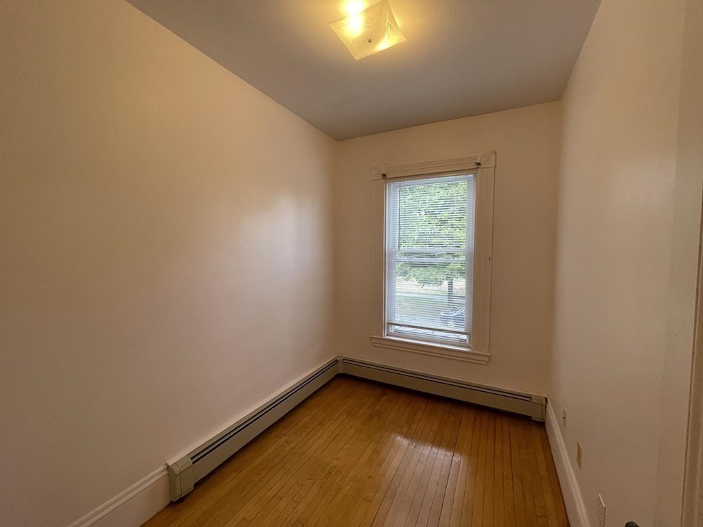 36-2 Lowell Avenue, Unit 362 Newton, MA 02460 - Photo 14 of 22 an empty room with a window