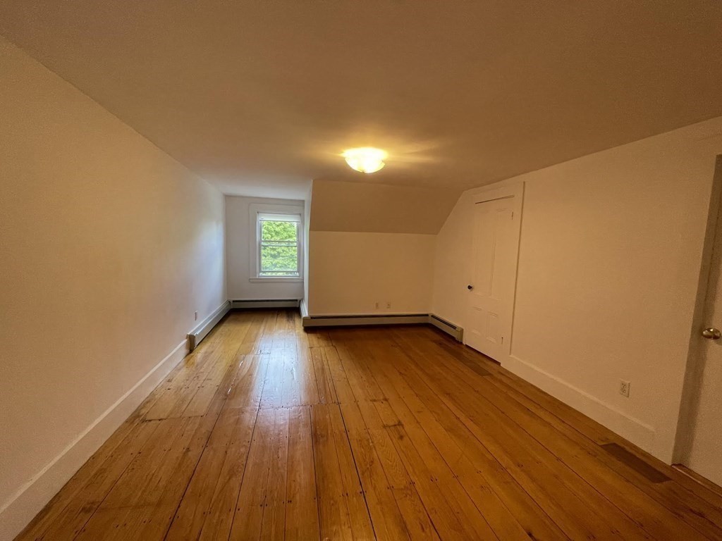 36-2 Lowell Avenue, Unit 362 Newton, MA 02460 - Photo 17 of 22 a view of empty room with wooden floor