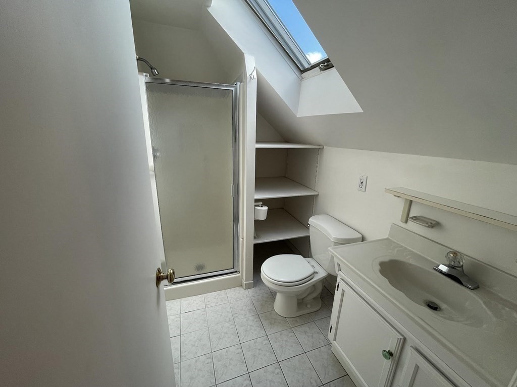 36-2 Lowell Avenue, Unit 362 Newton, MA 02460 - Photo 19 of 22 a bathroom with a sink and a toilet