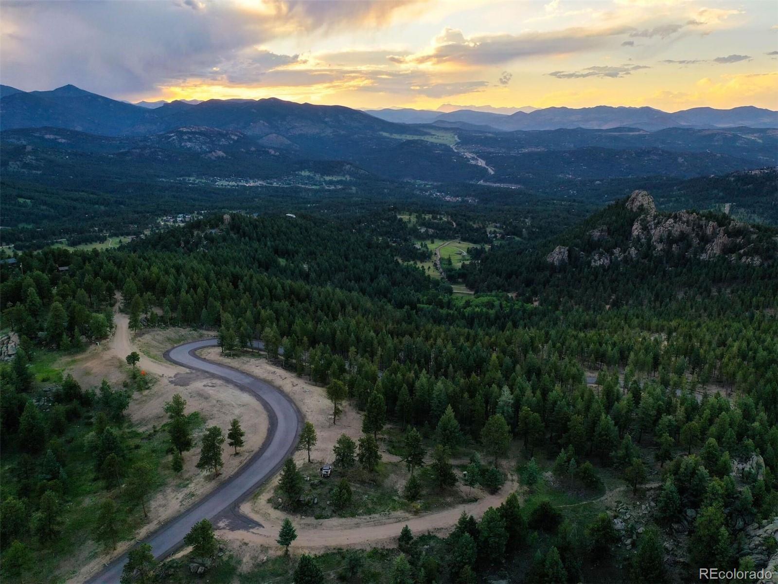 6371 Canyon Creek Road Evergreen, CO 80439 - Photo 25 of 38 a view of house and outdoor space