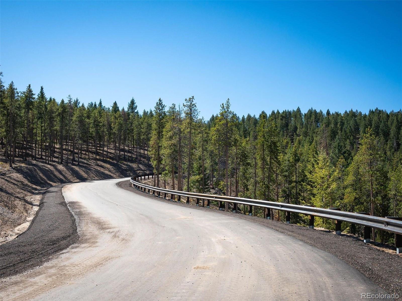 6371 Canyon Creek Road Evergreen, CO 80439 - Photo 27 of 38 a view of a yard with iron fence