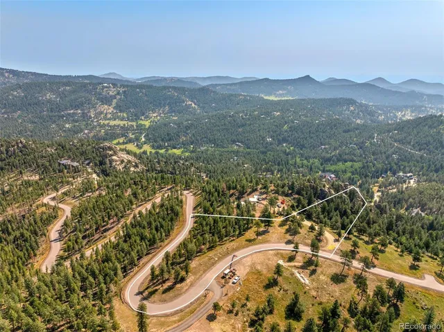 a view of lake and mountain
