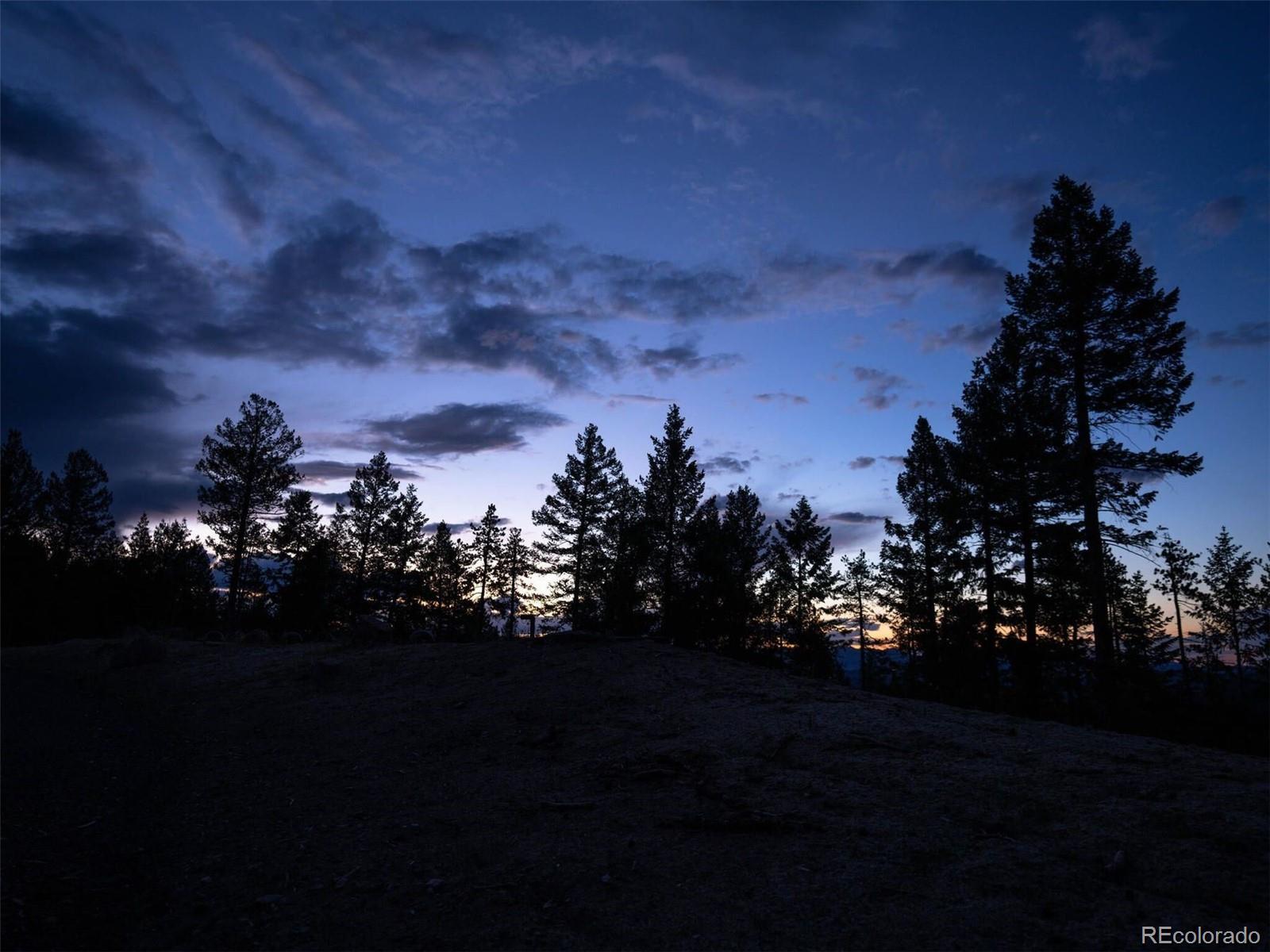 6371 Canyon Creek Road Evergreen, CO 80439 - Photo 34 of 38 a view of sunset