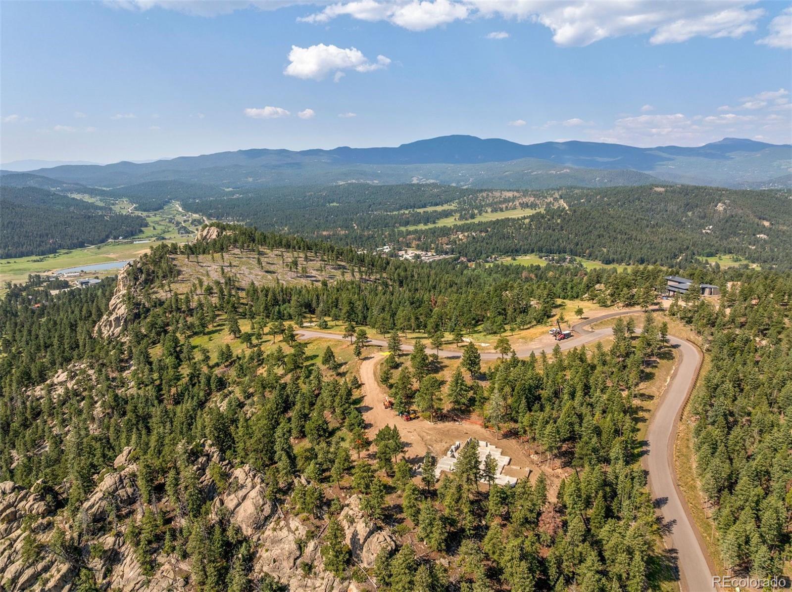 6371 Canyon Creek Road Evergreen, CO 80439 - Photo 4 of 38 a view of lake and mountain
