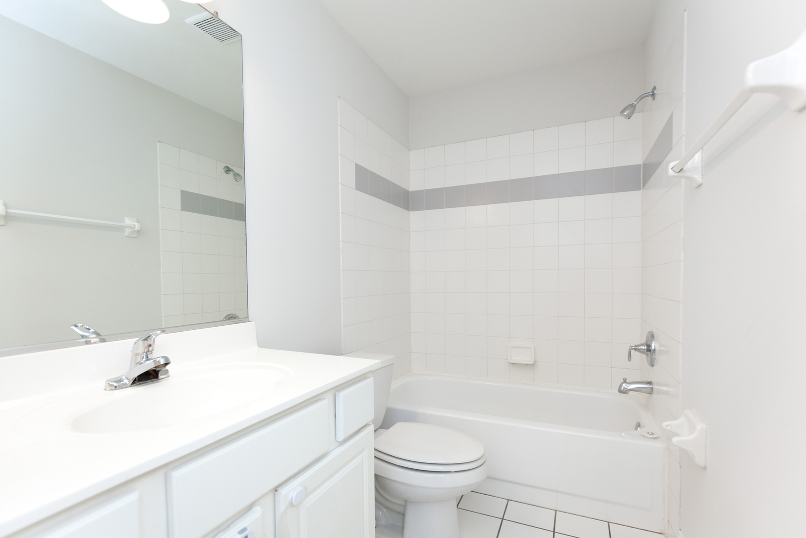 11 Foxcroft Road, Unit 239 Naperville, IL 60565 - Photo 11 of 13 a bathroom with a sink a toilet and a bathtub