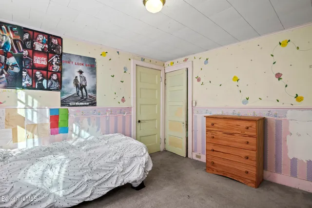 a view of livingroom with window and wooden floor