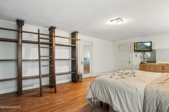 a view of a gym with potted plants