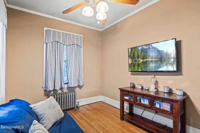 a view of a livingroom with furniture and window