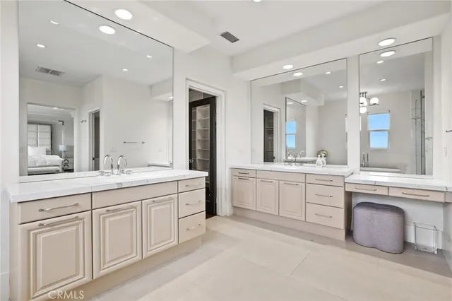 a view of a backyard with plants and a patio