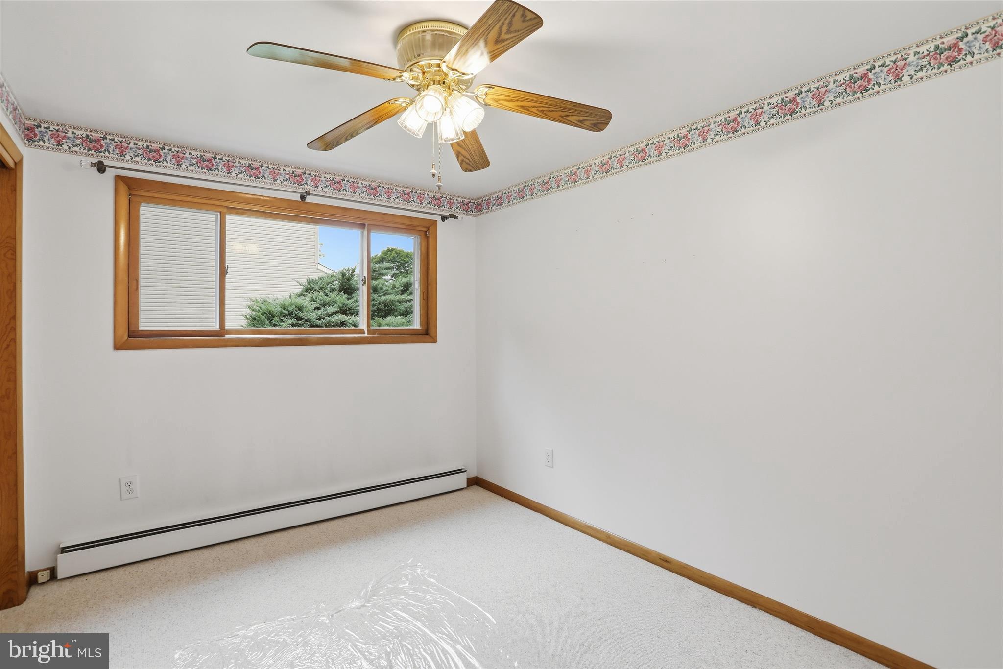 199 Buser Street Ridgeley, WV 26753 - Photo 19 of 49 a view of an empty room with a window