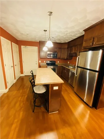 $300,000 | 15 Saw Mill Drive, Unit 103, North Kingstown, RI 02852