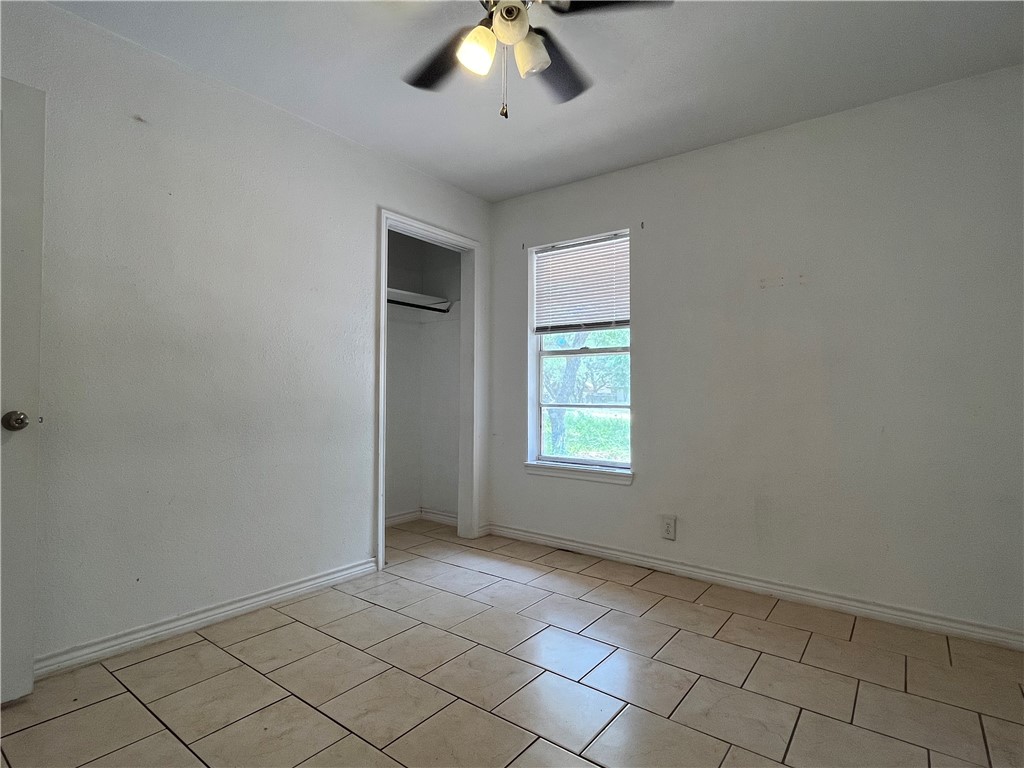 434 South 11th Street Aransas Pass, TX 78336 - Photo 9 of 16 a view of an empty room and window