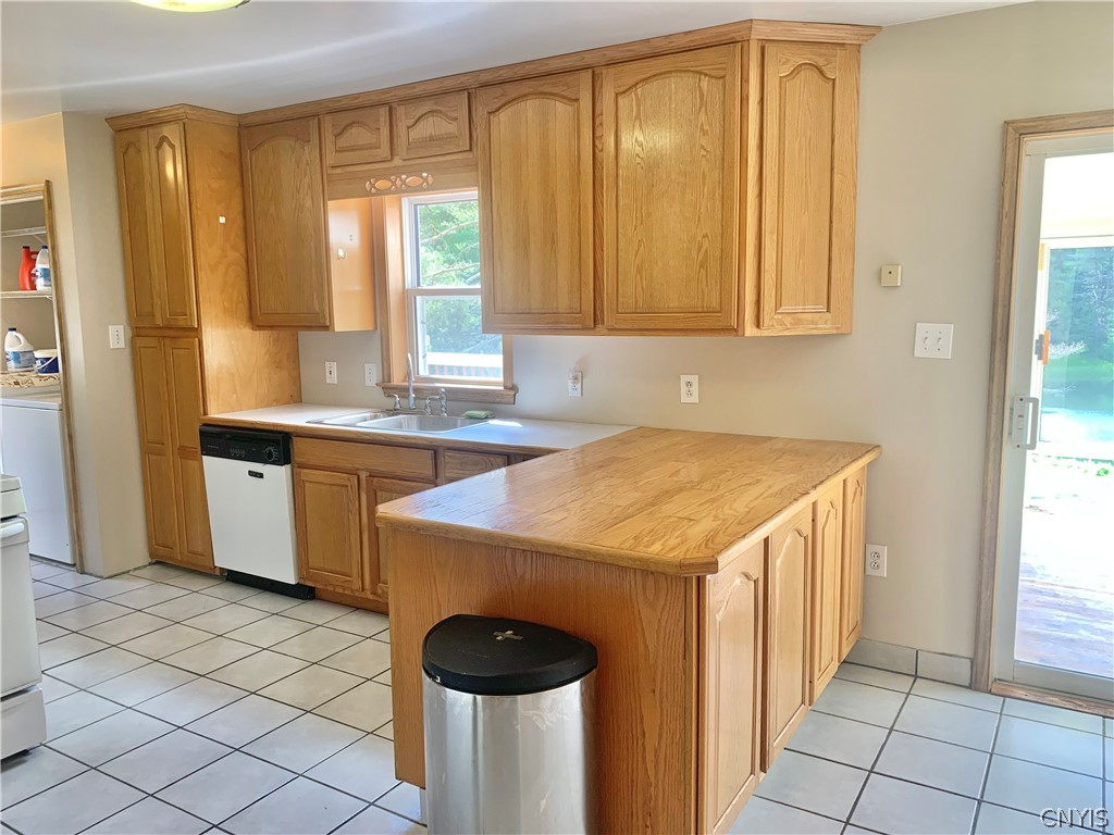 10149 Bailey Lake Road Brookfield, NY 13480 - Photo 23 of 49 Kitchen is set on tiled flooring