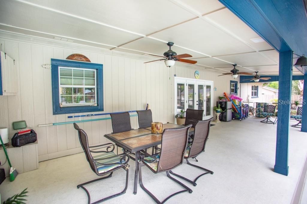 12802 North 53rd Street Temple Terrace, FL 33617 - Photo 25 of 38 a workspace with wooden floor and windows