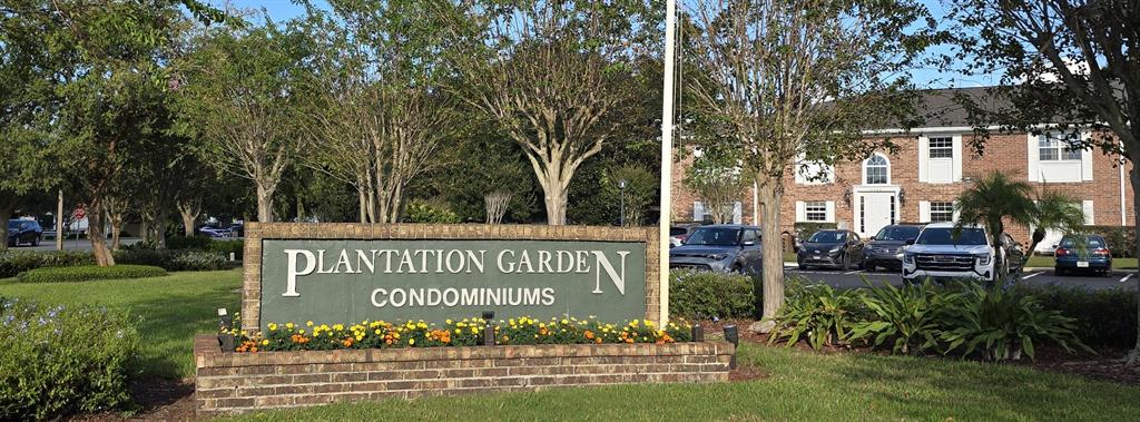 4320 Lake Underhill Road, Unit 14D2 Orlando, FL 32803 - Photo 11 of 15 a sign on the side of the building