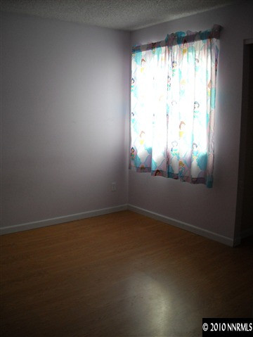 2782 Azuza Way Reno, NV 89502 - Photo 7 of 9 an empty room with a window