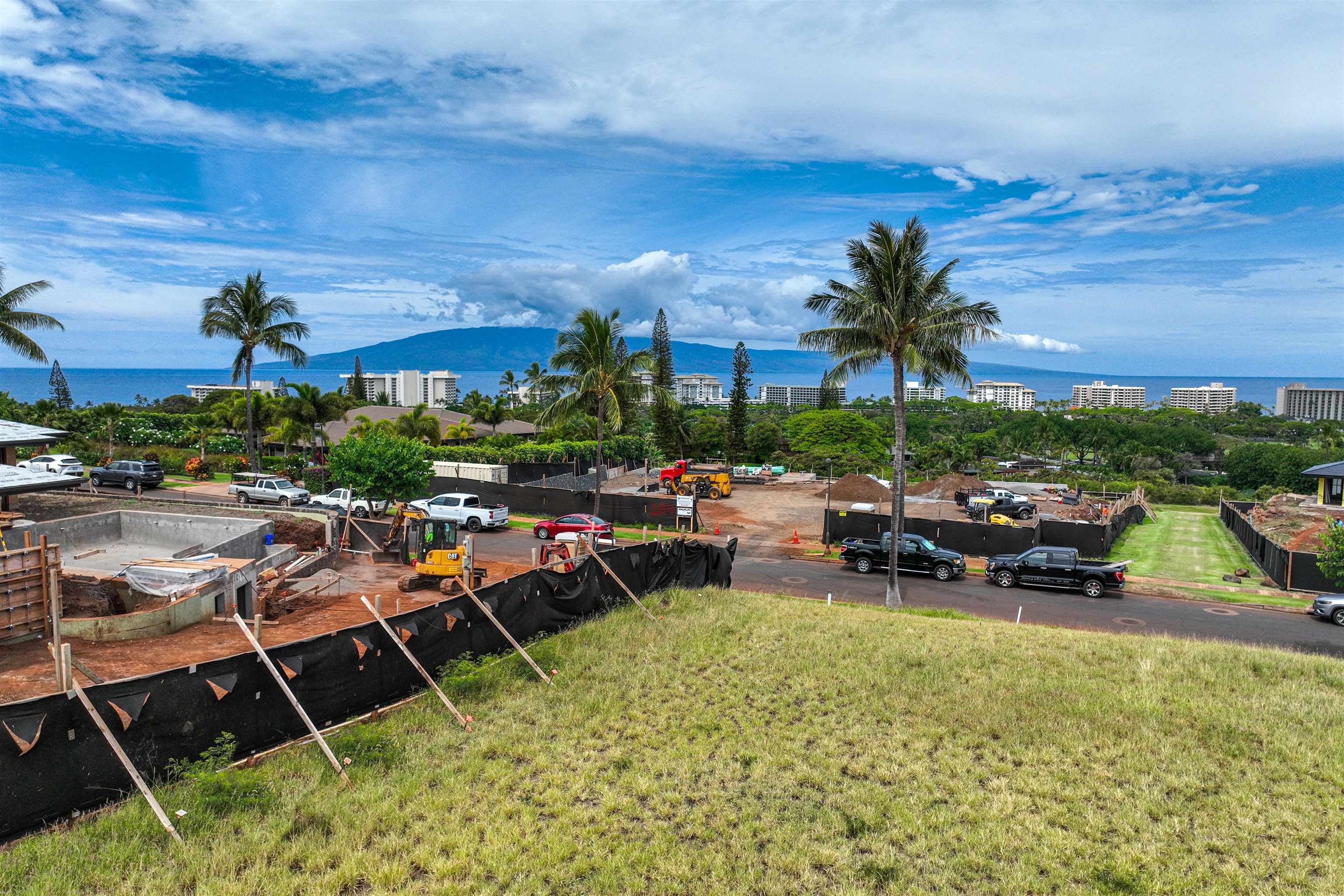167 Anapuni Loop, Unit 26 Lahaina, HI 96761 - Photo 15 of 27 a view of a lake with outdoor seating space