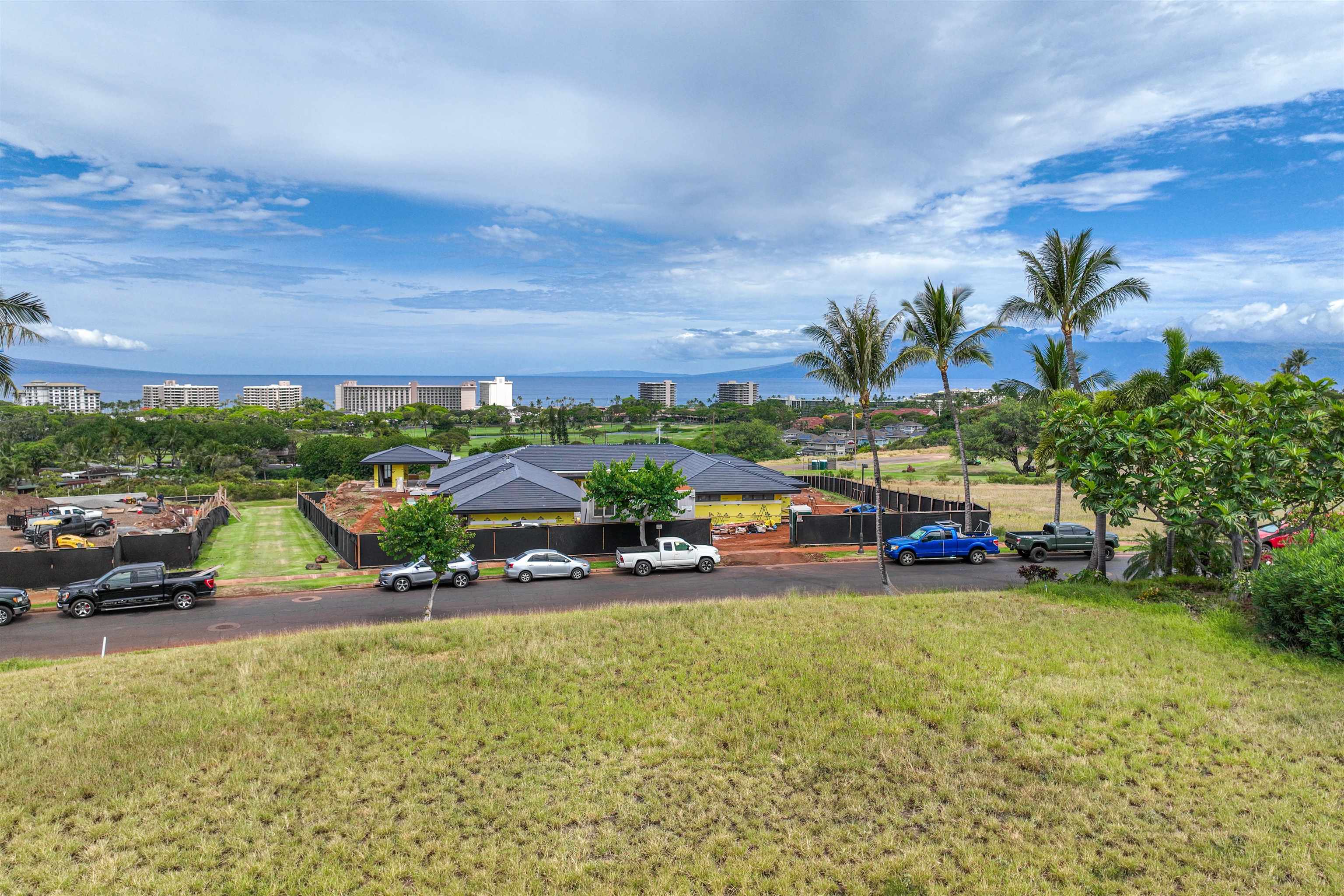 167 Anapuni Loop, Unit 26 Lahaina, HI 96761 - Photo 17 of 27 a view of a street with cars parked