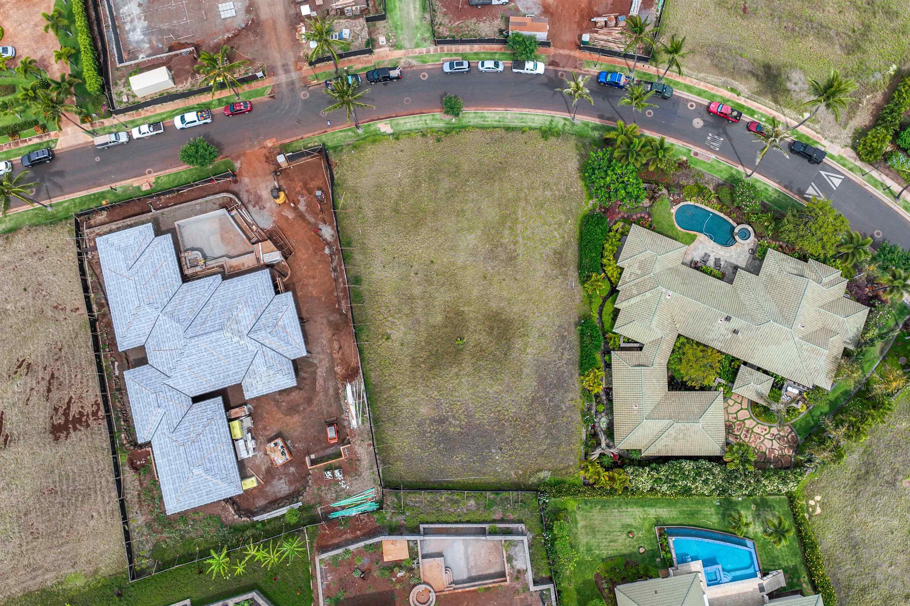 167 Anapuni Loop, Unit 26 Lahaina, HI 96761 - Photo 2 of 27 an aerial view of residential house with outdoor space and parking