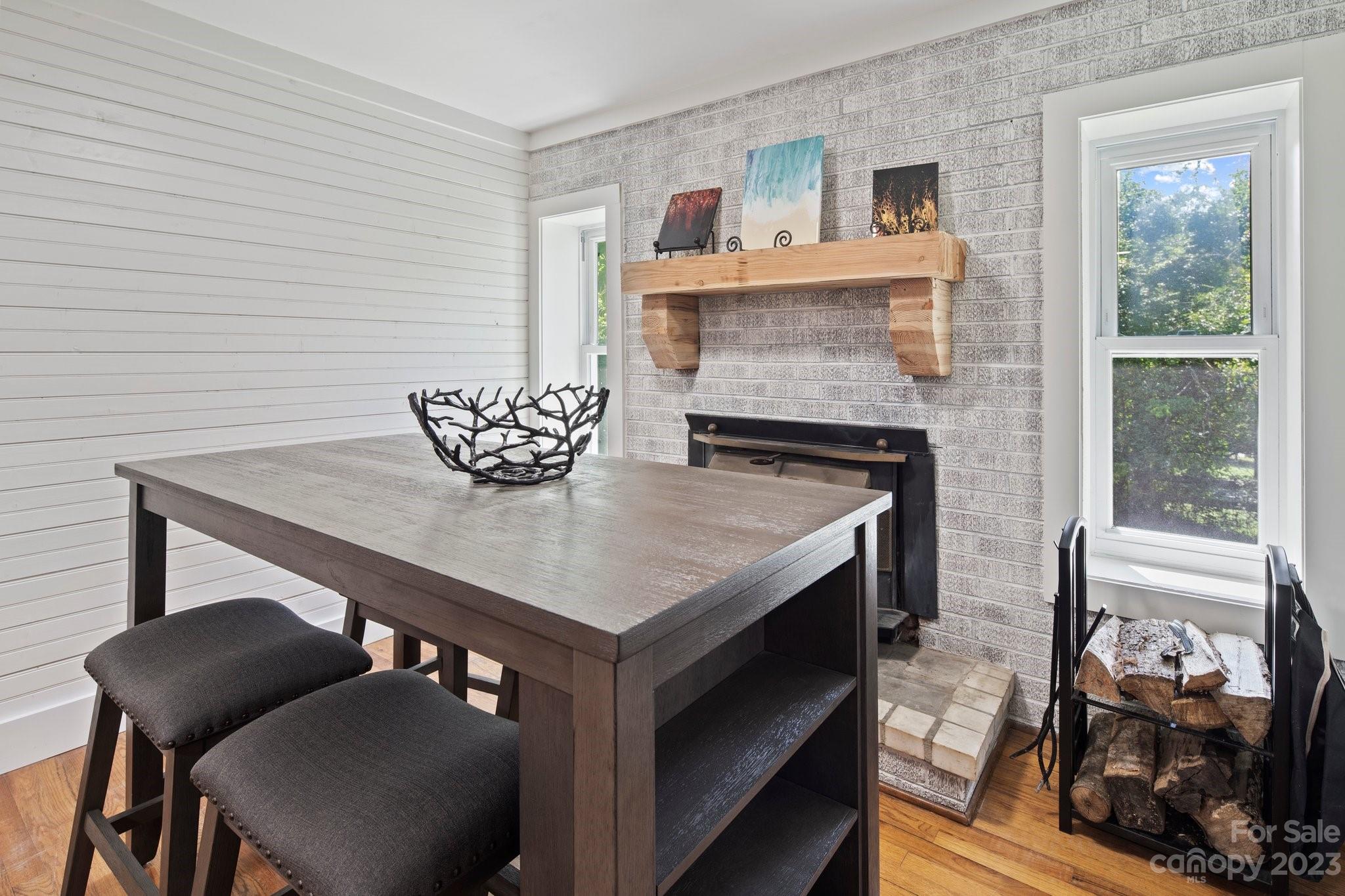 115 James E Davis Drive Mills River, NC 28759 - Photo 12 of 27 a living room with furniture and a fireplace
