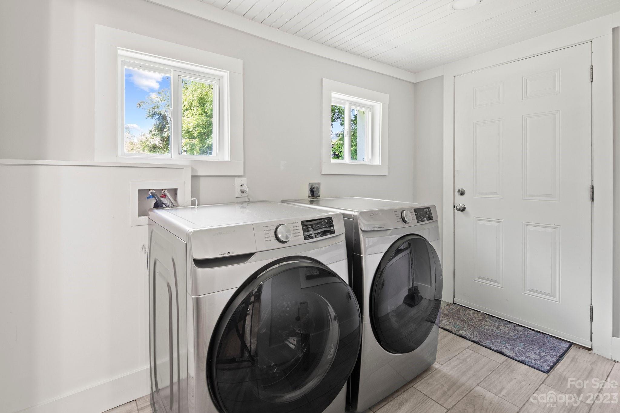 115 James E Davis Drive Mills River, NC 28759 - Photo 19 of 27 a utility room with dryer and washer
